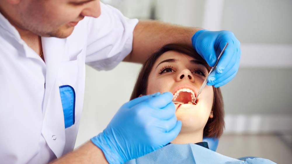زمان مراجعه به پزشک برای معالجه دندان درد